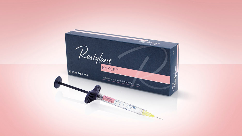Restylane Kysse lip filler with syringe in front of brand package.