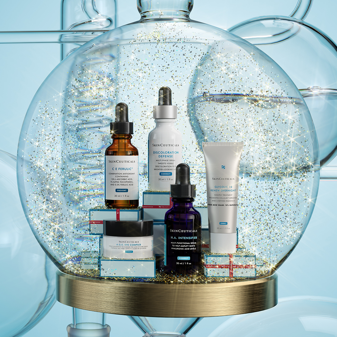 SkinCeuticals skin care products displayed inside a snow globe for the holidays.