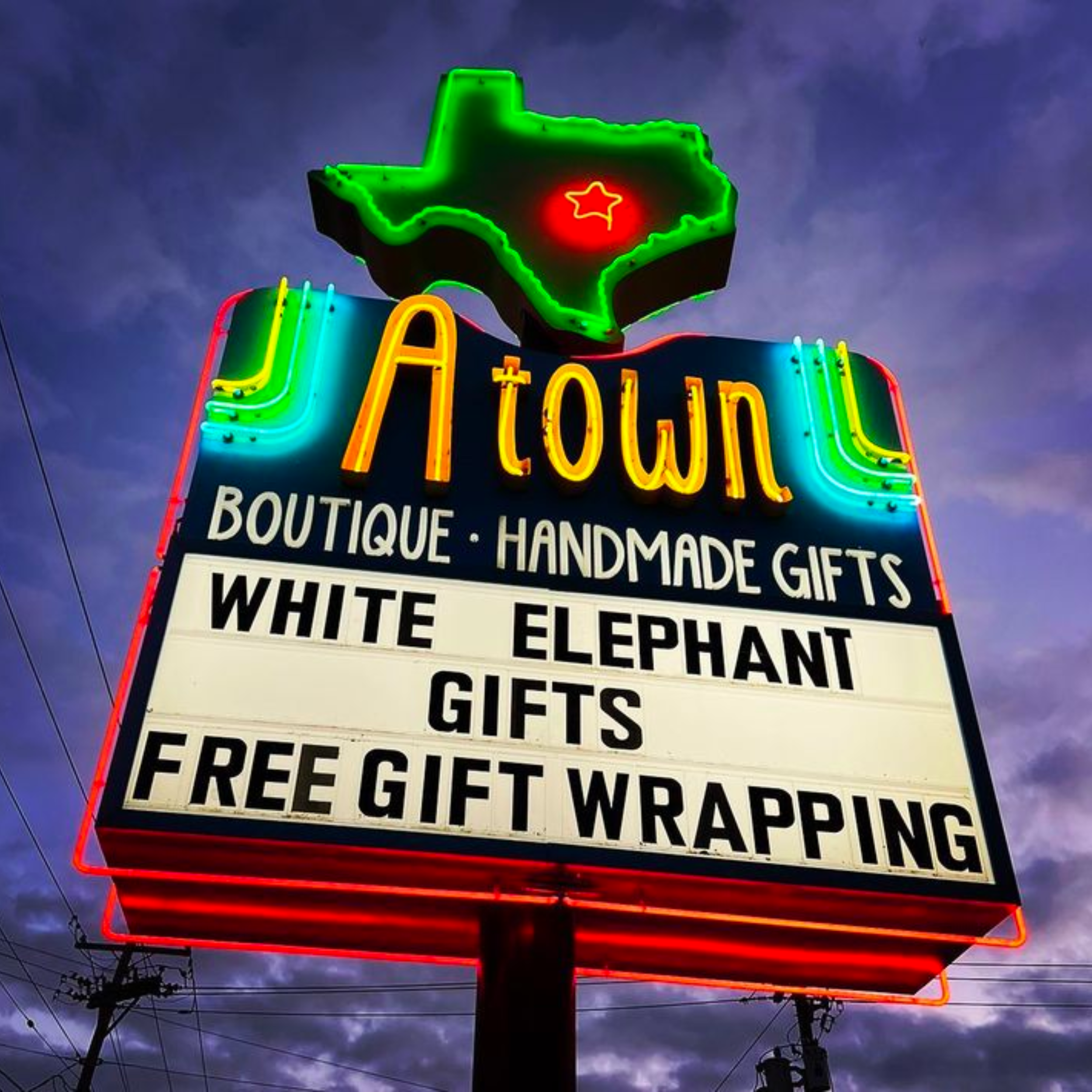 ATown Gift Shop neon sign at night in Austin, Texas